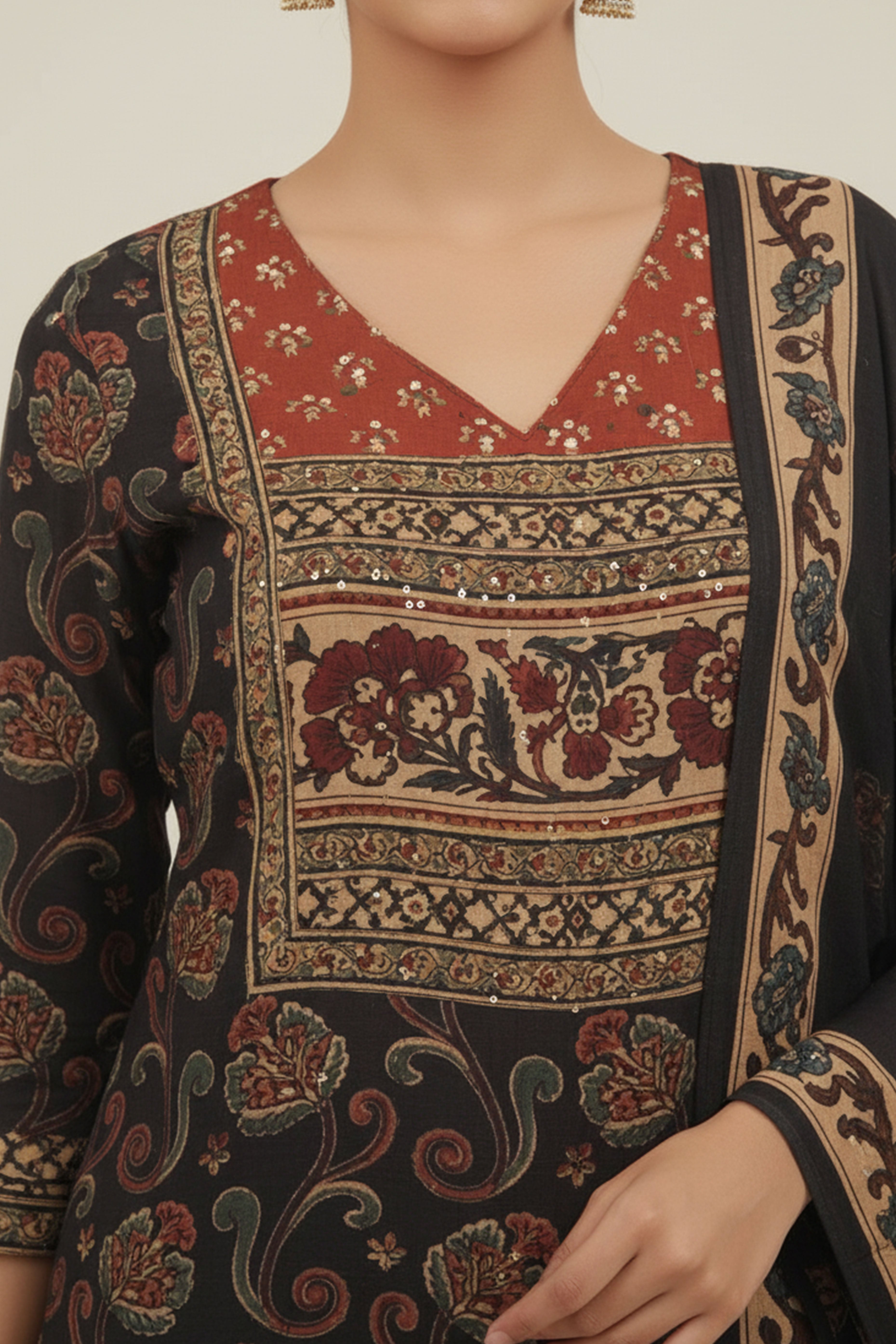 Black Muslin Straight Suit Adorned with Floral Prints & Hand Embroidery