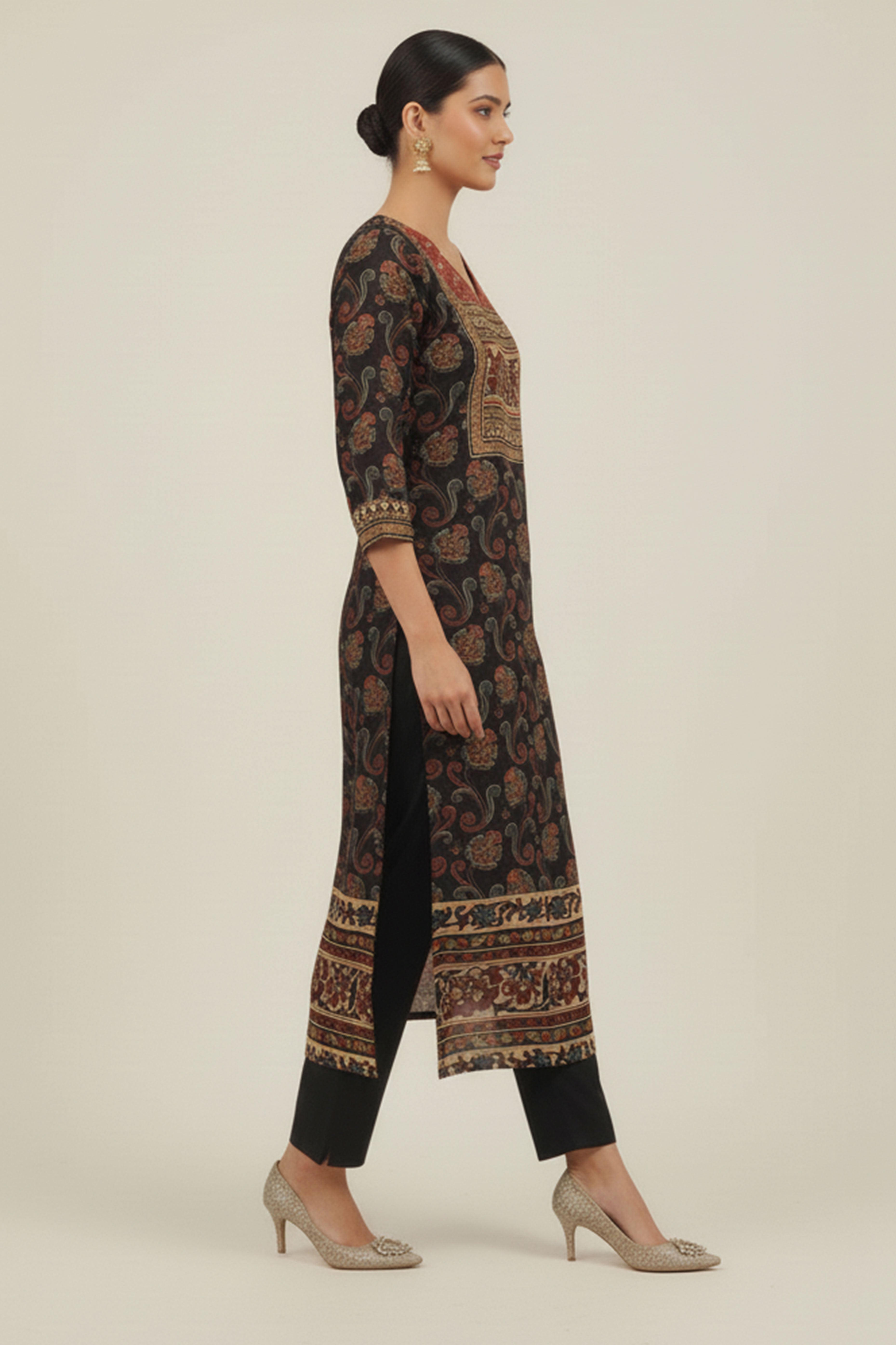 Black Muslin Straight Suit Adorned with Floral Prints & Hand Embroidery