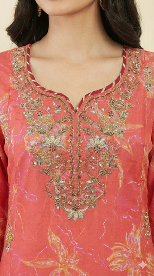 Red Muslin Straight Salwar Suit Highlighted with Graceful Floral Prints and Handcrafted Beads Work