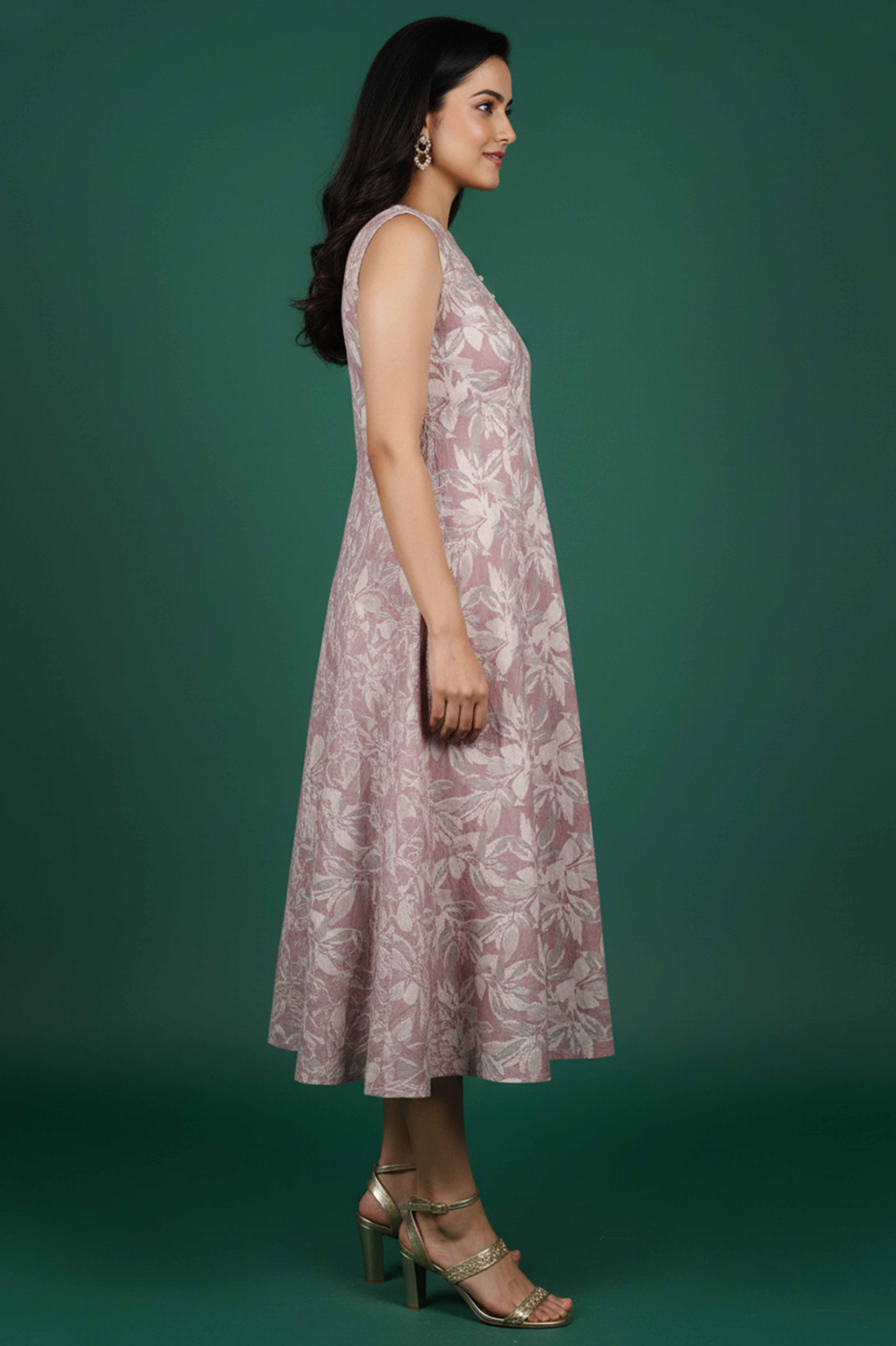 Stylish Peach Cotton Blend Dress Featuring Floral Prints & Sleeveless Cut With Pearl Button