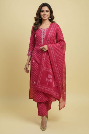Graceful Pink Cotton Salwar Suit Highlighted with Leheriya Print and Thread Detailing