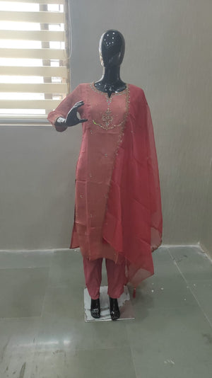 Rust Pure Viscose Silk Suit with Detailed Thread Work Embellishments - Model View 1