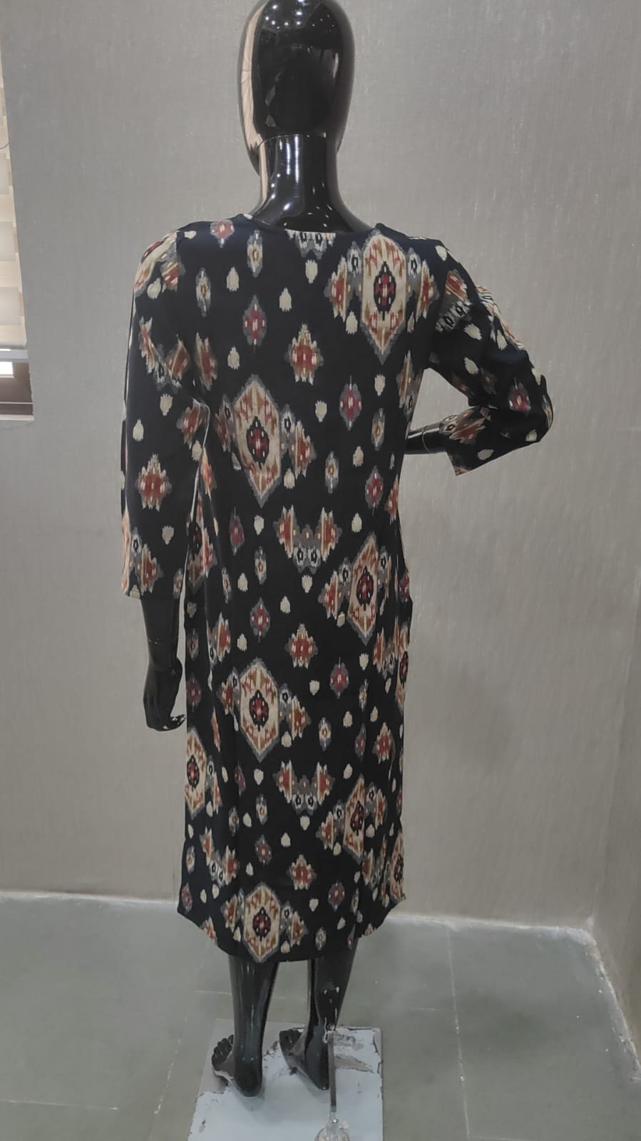 Blue Straight Cut Rayon Kurti with Traditional Ikkat Design and Foil Finish - Model View 1