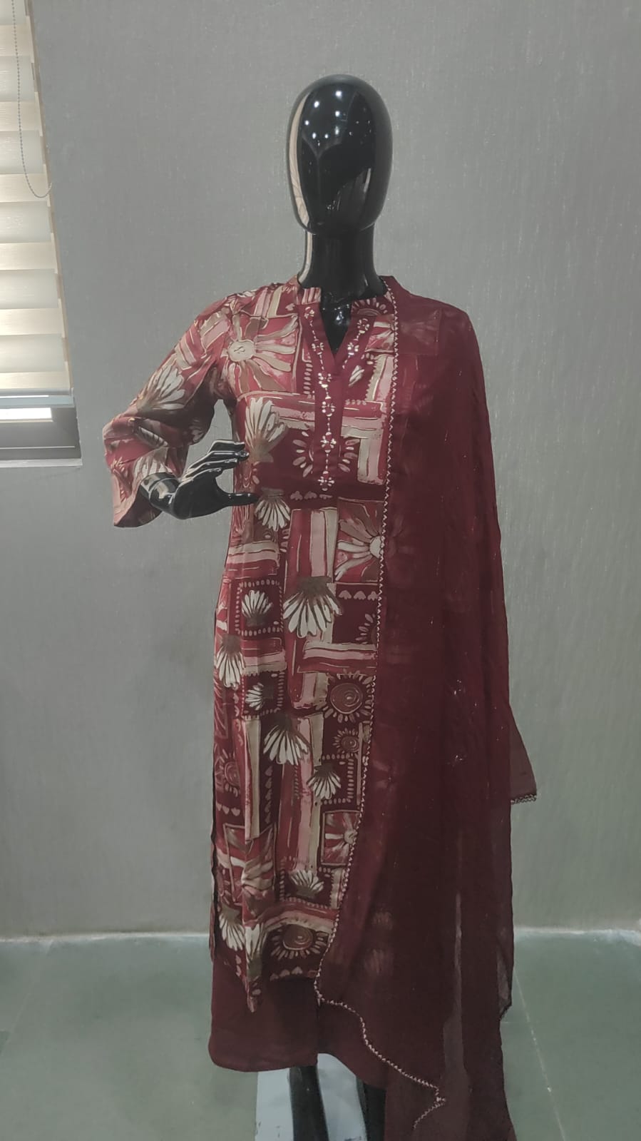 Elegant Maroon Floral Printed Straight Cut Salwar Suit Adorned With Mirror & Sequin On The Neckline - Model View 3