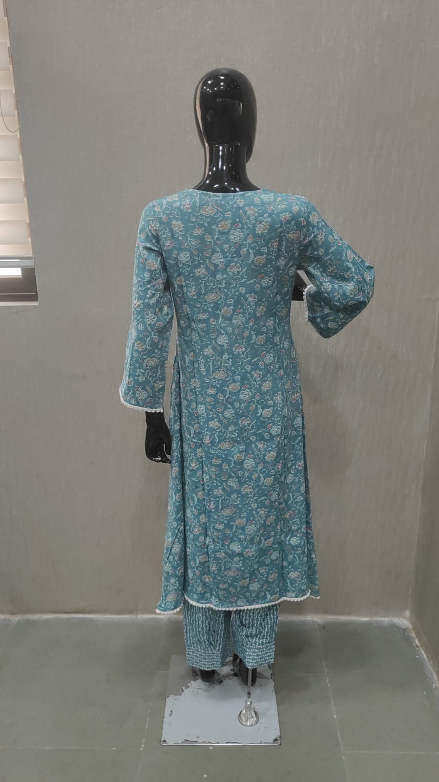Lightweight Sky Blue Floral Printed Rayon Salwar Suit with A-Line Design - Image 1