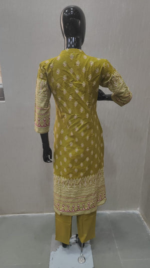 Graceful Green Floral Pure Cotton Straight Fit Salwar Suit for Effortless Ethnic Style - Model View 2