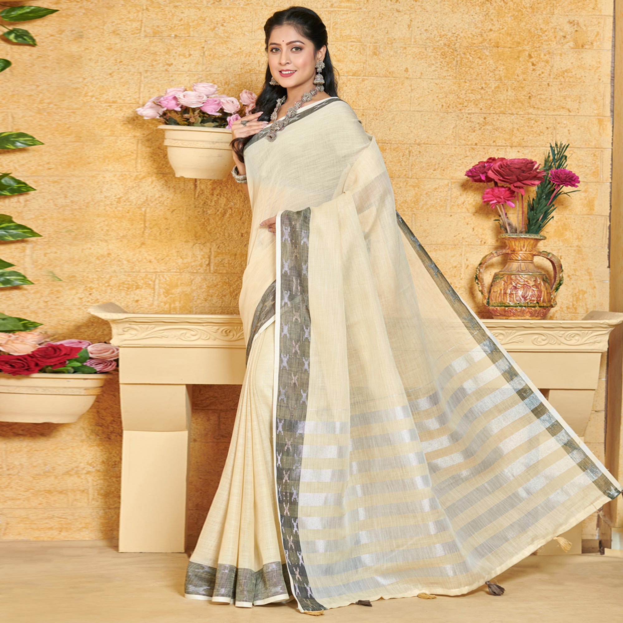 Cream Woven Linen Saree With Tassels