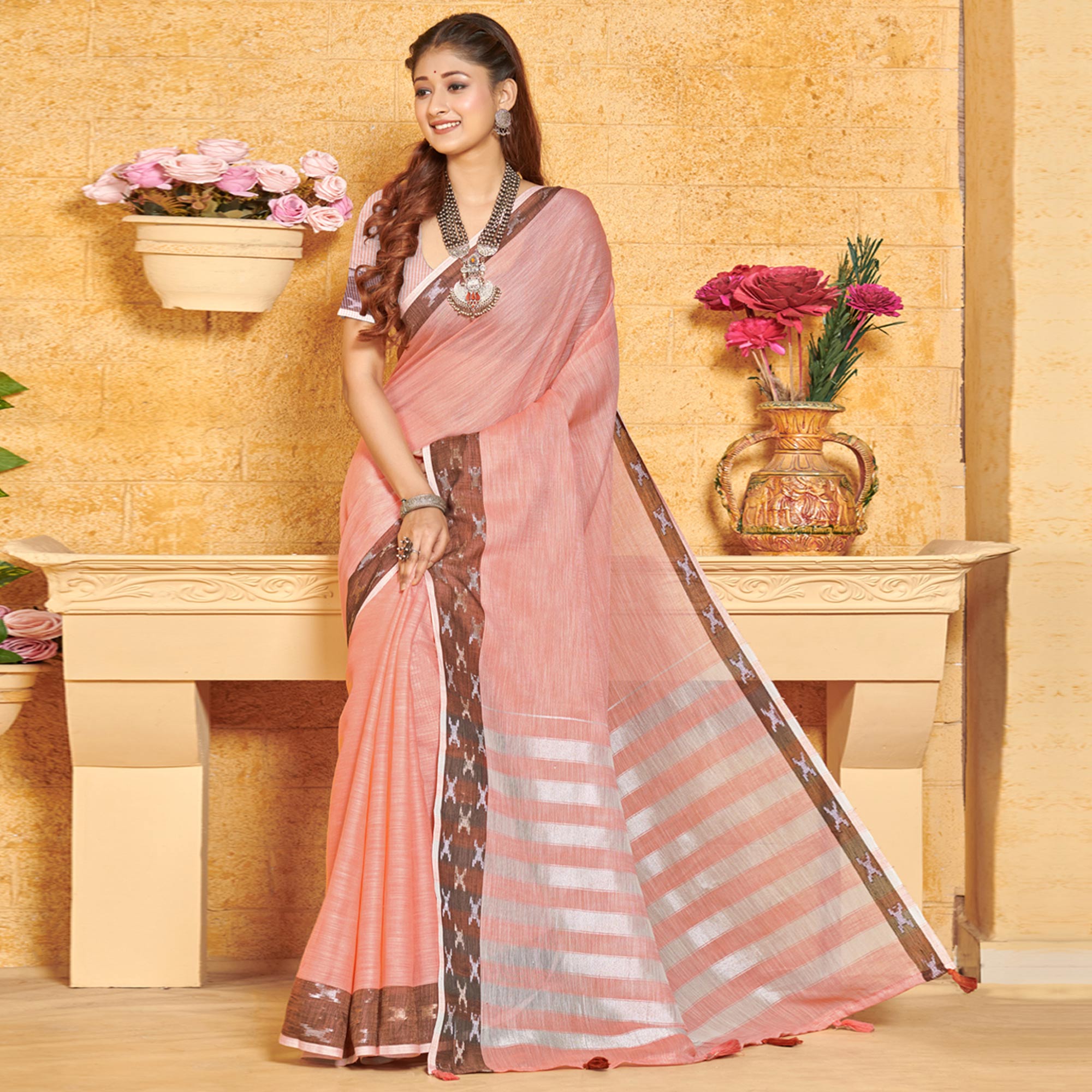 Pink Woven Linen Saree With Tassels