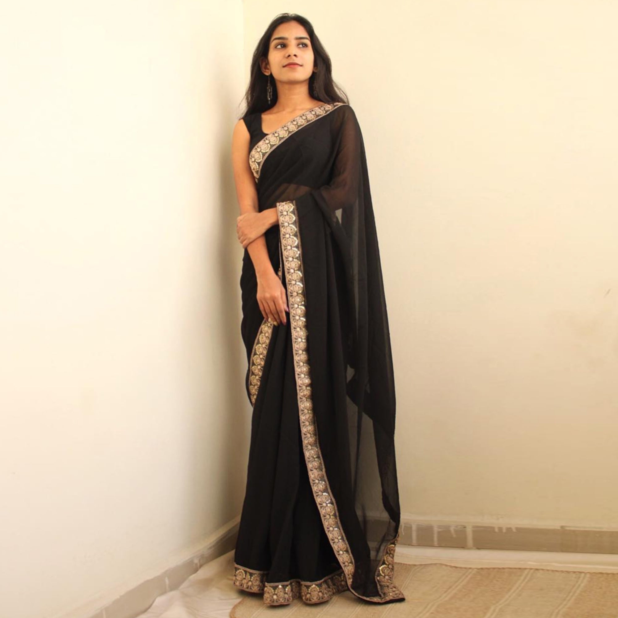 Black Sequins Embroidered Border Georgette Saree