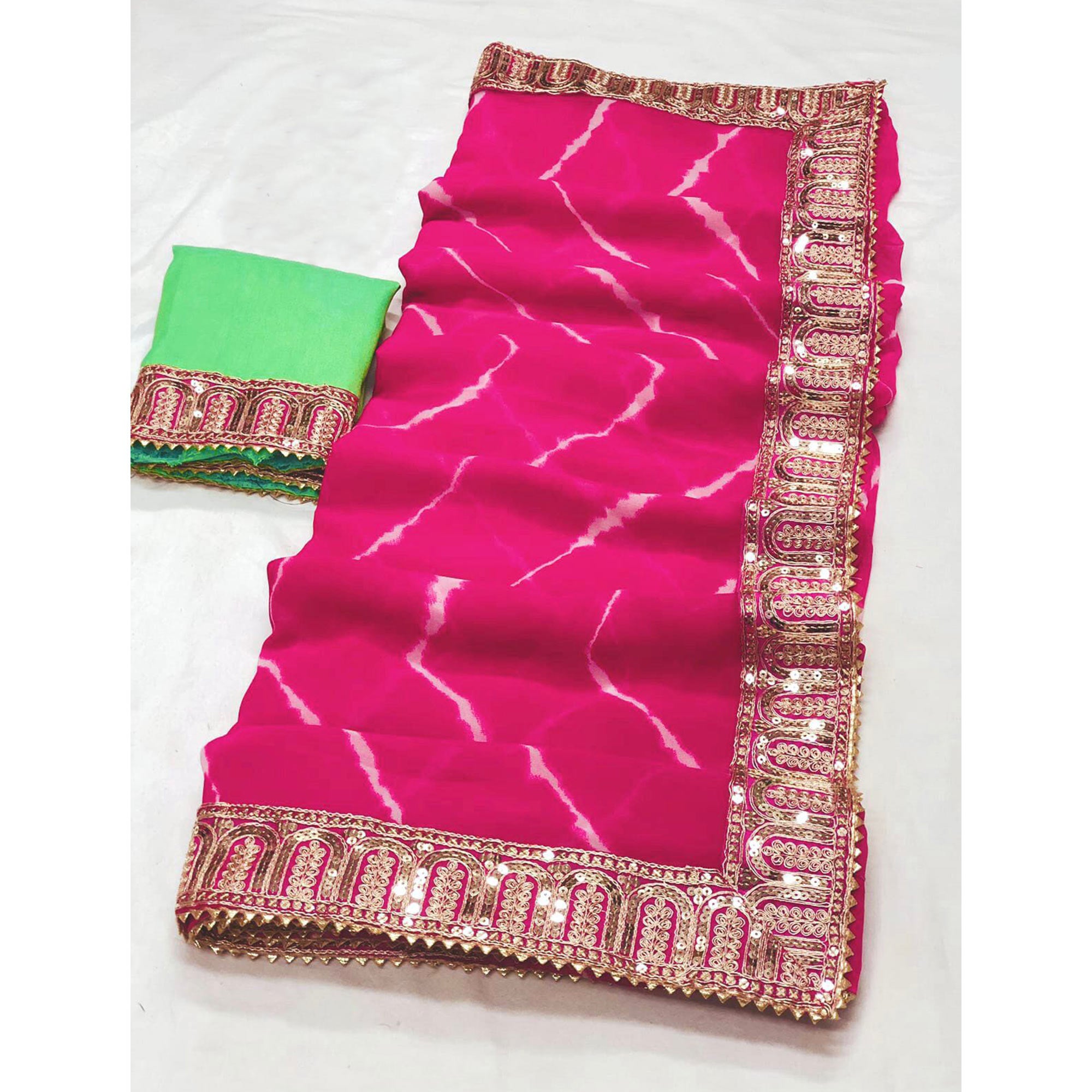 Pink Printed With Sequins Embroidered Border Georgette Saree