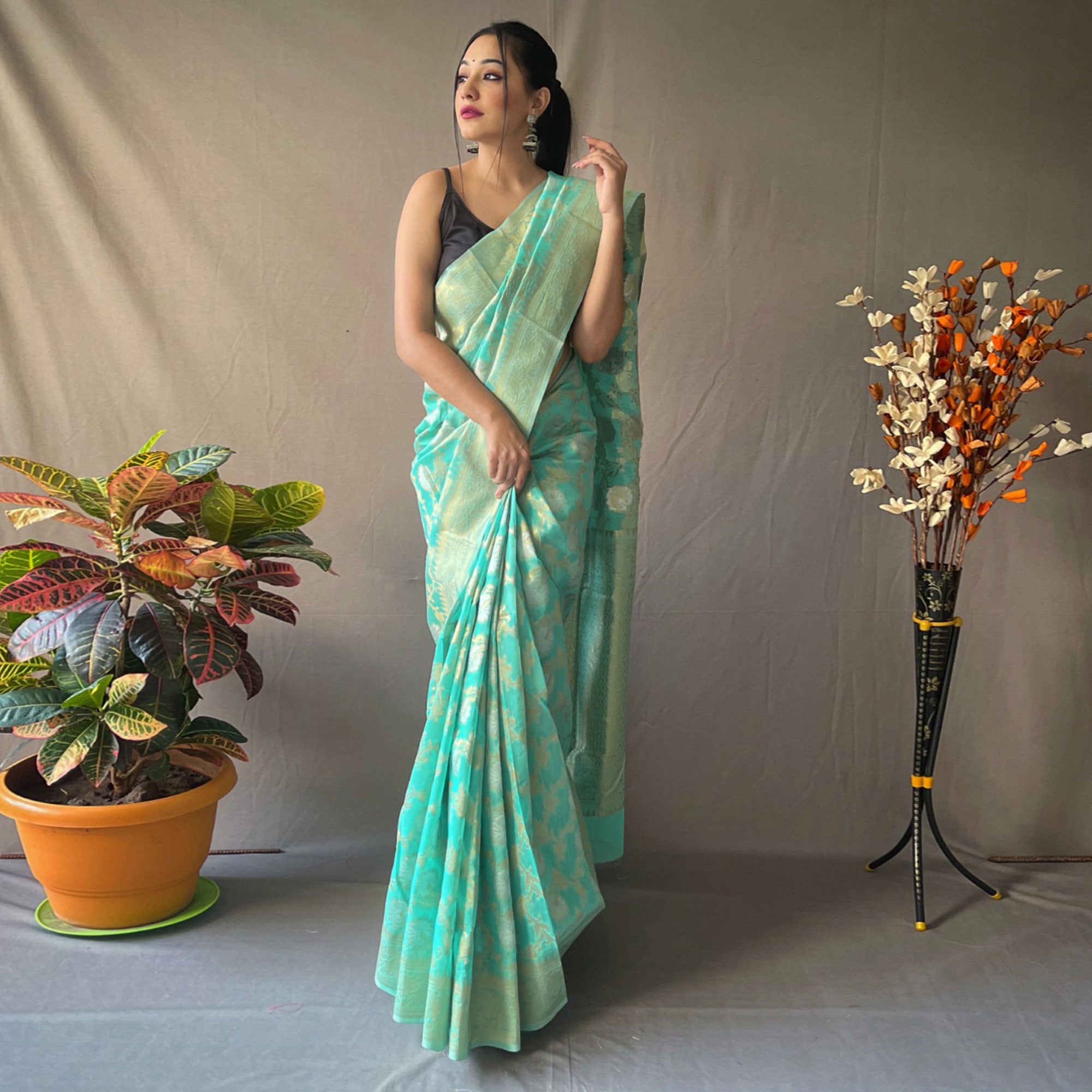 Rama Green Floral Woven Linen Saree