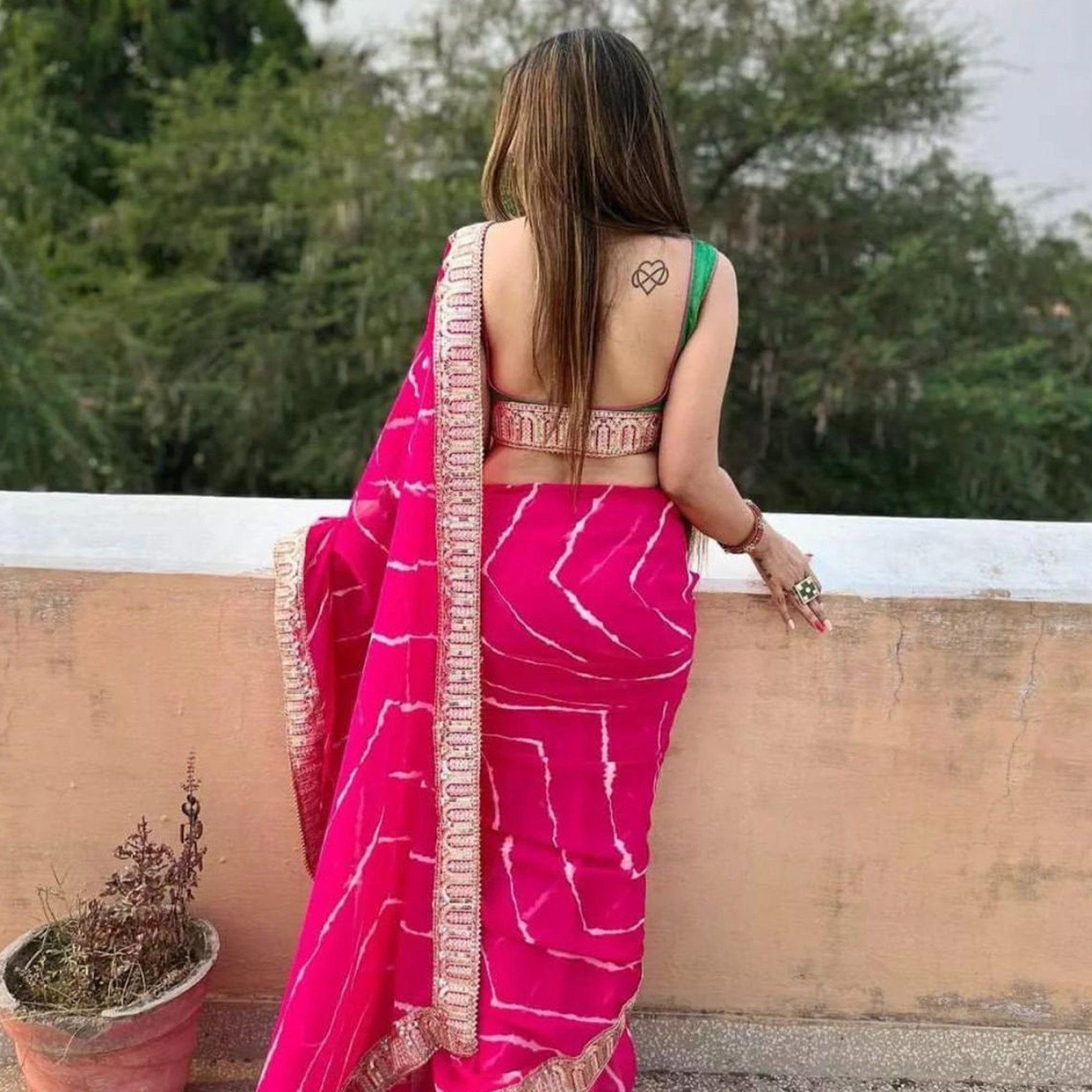 Pink Printed With Sequins Embroidered Border Georgette Saree