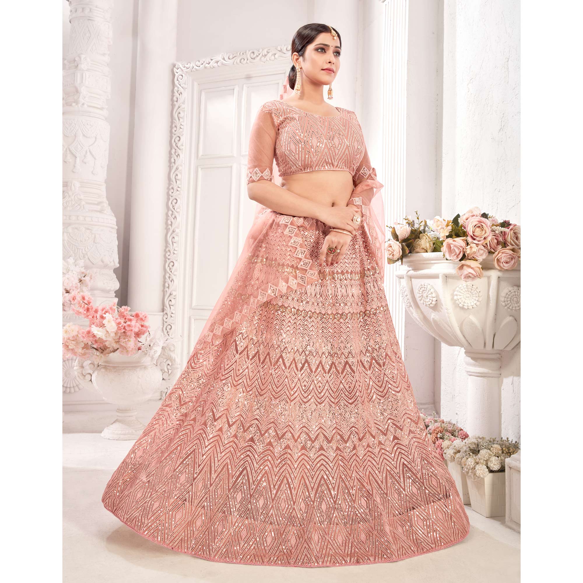 Peach Sequins Embroidered Netted Lehenga Choli - Image 1
