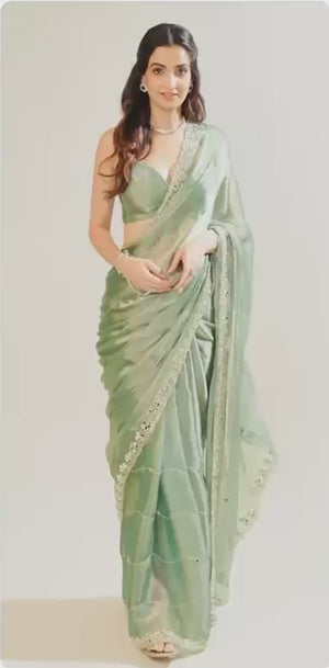 Pista Green Art Silk Saree Highlighted with Embroidery & Mirror Detailing