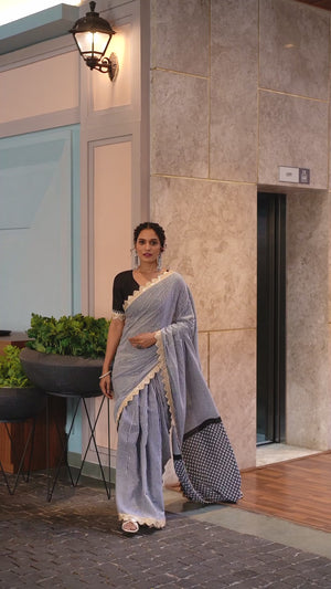 Office-Ready Black & White Mulmul Saree with Print and Embroidery Border