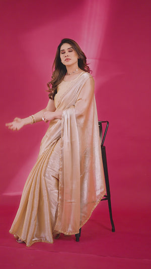 Party Wear Beige Chiffon Solid Saree with Delicate Border Embellishment