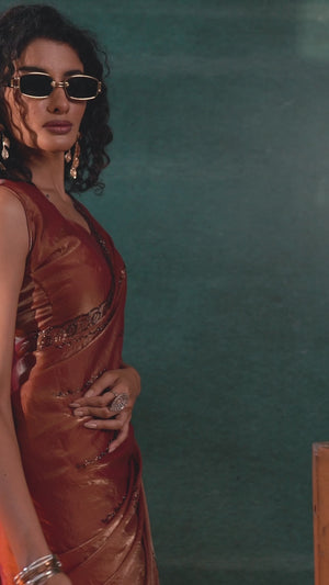 Brick Red Satin Silk Saree with Dazzling Stone Embellishments for Special Occasions