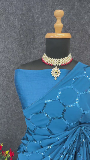 Blue Georgette Silk Saree Embellished With Sparkling Sequins Embroidery & Piping Border