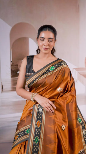 Brown Art Silk Saree Adorned with Intricate Patola Style Woven Designs