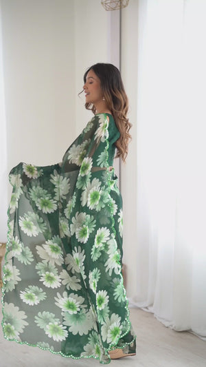Green Georgette Saree Featuring Floral Prints & Shimmering Mirror Work Border