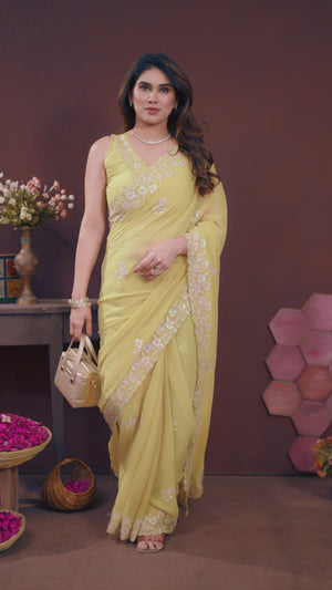 Yellow Georgette Saree Featuring Intricate Floral Sequin Embroidery