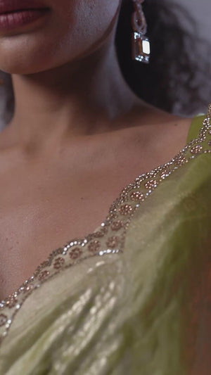 Green Satin Silk Saree Showcasing Elegant Floral Foil Prints & Dazzling Zarkan Work