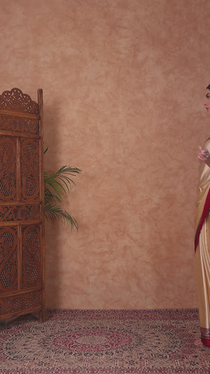 Cream & Red Modal Satin Saree Featuring a Solid Base and Artisanal Ajrakh Pallu