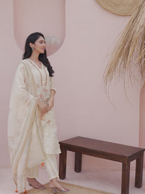 Powder Yellow Cotton Linen Salwar Suit with Printed Blooms and Delicate Embroidery Highlights