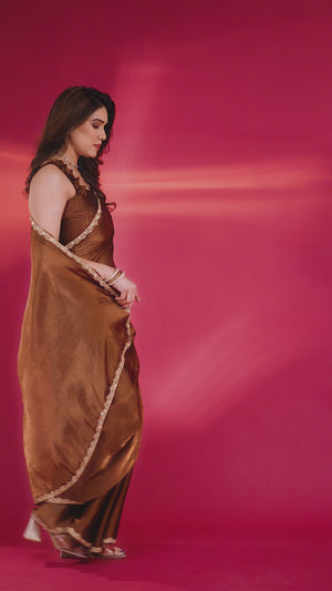 Party Wear Brown Chiffon Solid Saree with Delicate Border Embellishment