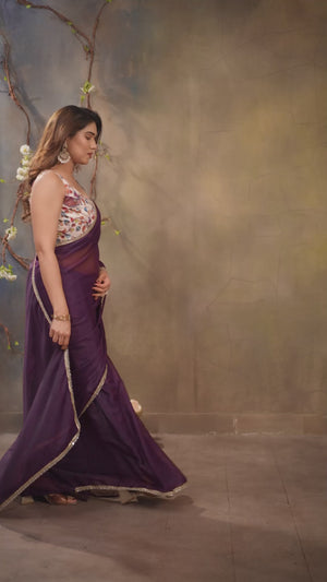 Wine Solid Sparkling Georgette Saree Enhanced With Shimmering Mirror Border