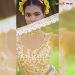 Yellow Sequins Embroidered Net Semi Stitched Lehenga Choli