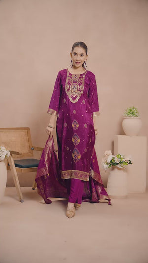 Wine Colored Viscose Jacquard Silk Straight Salwar Suit With Zari Weaving And Stone Work.