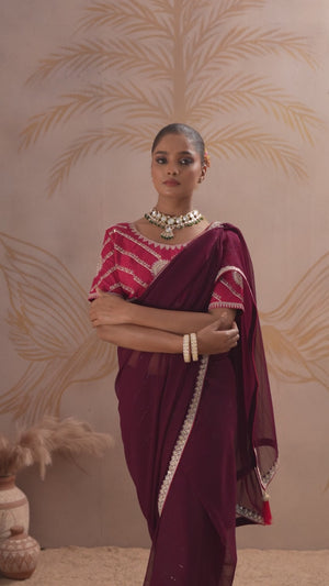 Wine Zari Embroidered Georgette Saree Accented With Sequins