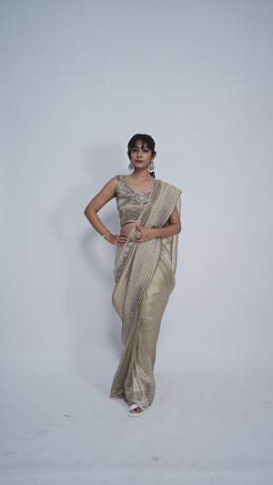 Elegant Beige Kanjivaram Silk Saree Adorned With Stone Work & Cut Dana Detailing