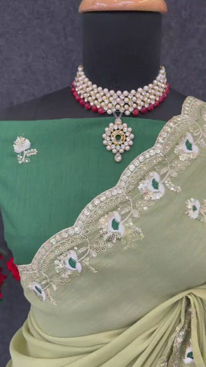 Green Georgette Silk Saree With Floral Sequin Embroidery & Graceful Cutwork Detailing Border