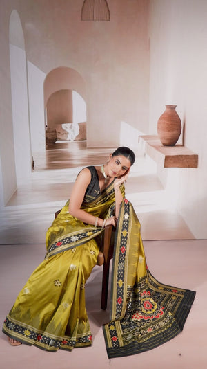 Olive Art Silk Saree Adorned with Intricate Patola Style Woven Designs