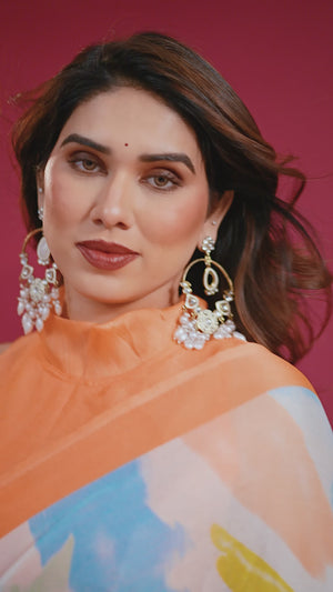 Elegant Orange Abstract Print Saree in Lightweight Chiffon
