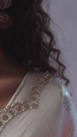 Offwhite Satin Silk Saree Showcasing Elegant Floral Foil Prints & Dazzling Zarkan Work