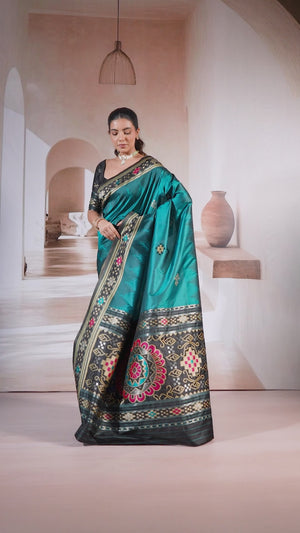 Teal Art Silk Saree Adorned with Intricate Patola Style Woven Designs