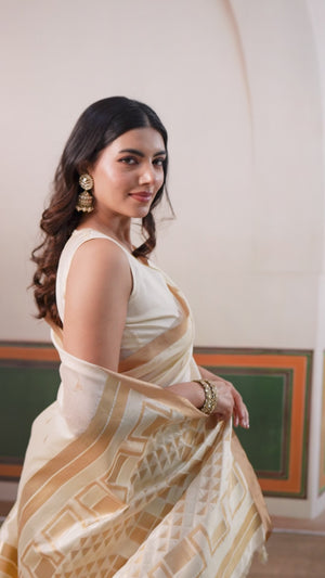 Classic Offwhite Tussar Silk Saree Showcasing Rich Geometric Weaving & Trendy Tassel Pallu