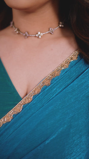 Party Wear Teal Chiffon Solid Saree with Delicate Border Embellishment