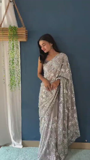Grey Sequins Embellished Georgette Saree with Delicate Embroidery and Sheer Grace