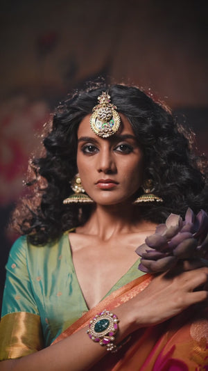 Dark Peach Banarasi Silk Saree with Floral Zari Weaving