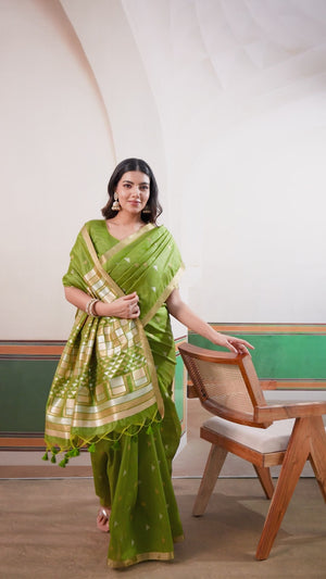 Classic Green Tussar Silk Saree Showcasing Rich Geometric Weaving & Trendy Tassel Pallu