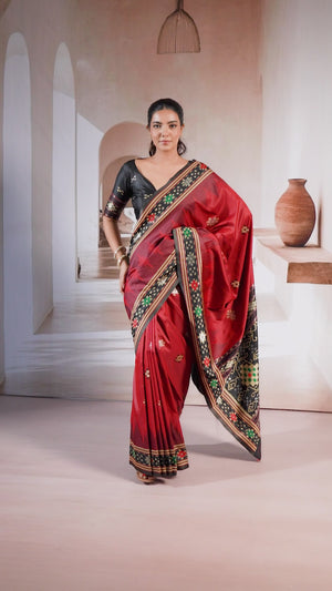 Maroon Art Silk Saree Adorned with Intricate Patola Style Woven Designs
