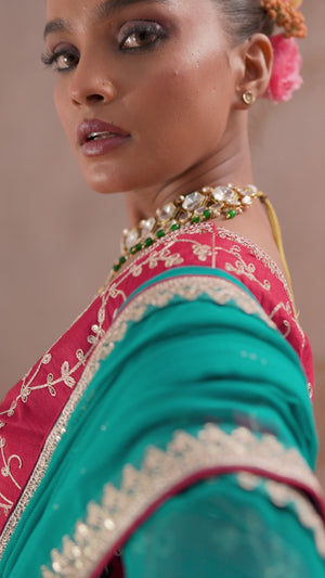 Sky Blue Zari Embroidered Georgette Saree Accented With Sequins