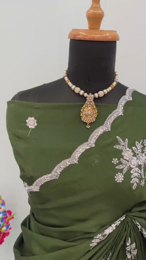 Green Chinon Saree Adorned With Zari Floral Embroidery & Gleaming Sequins Work