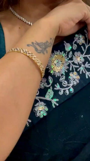 Teal Georgette Saree Featuring Fine Sequin Embroidery for a Glam Look