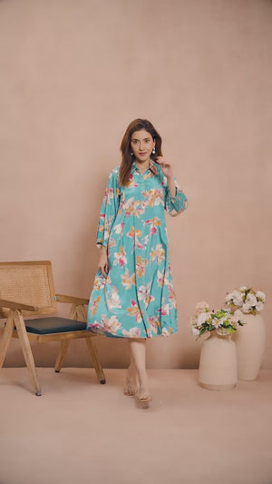 Turquoise Floral Printed Muslin Dress with a Flattering A-Line Silhouette