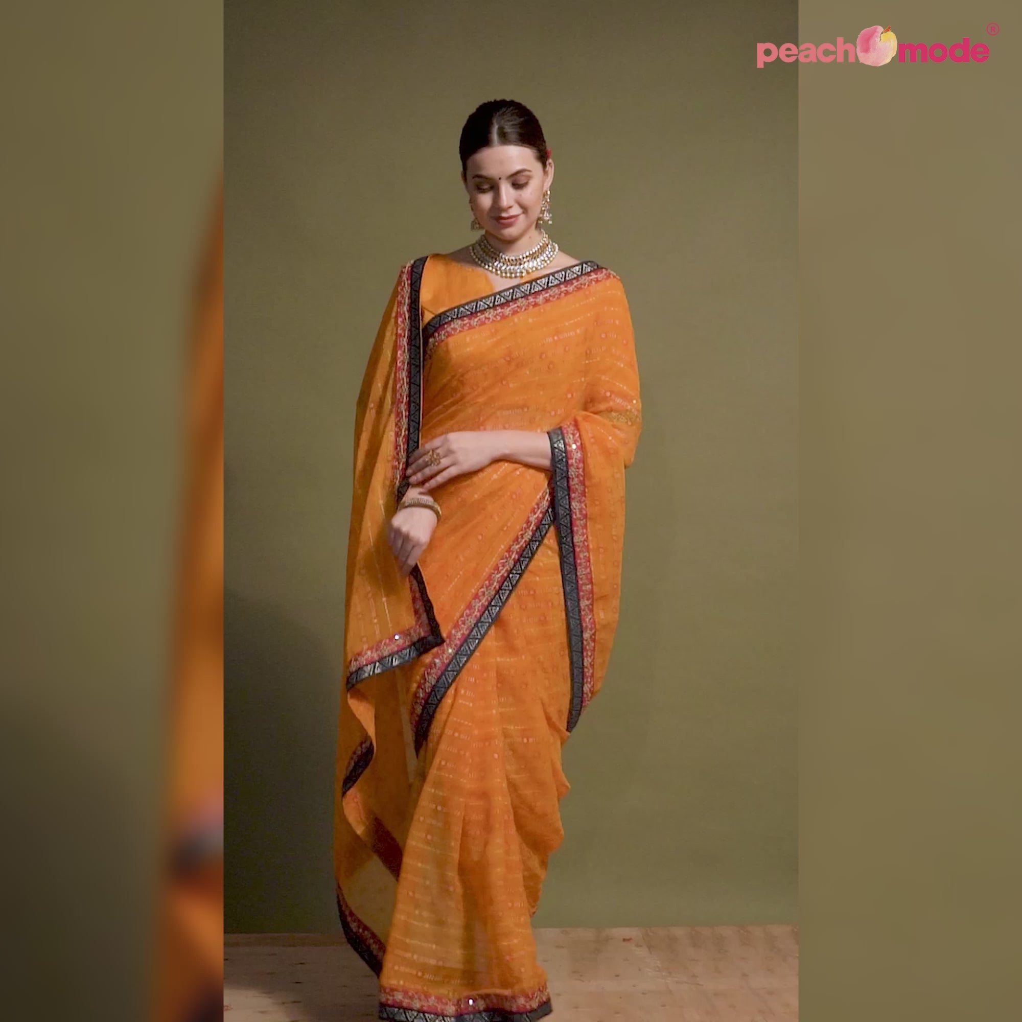 Orange Foil Printed Georgette Saree With Embroidered Border